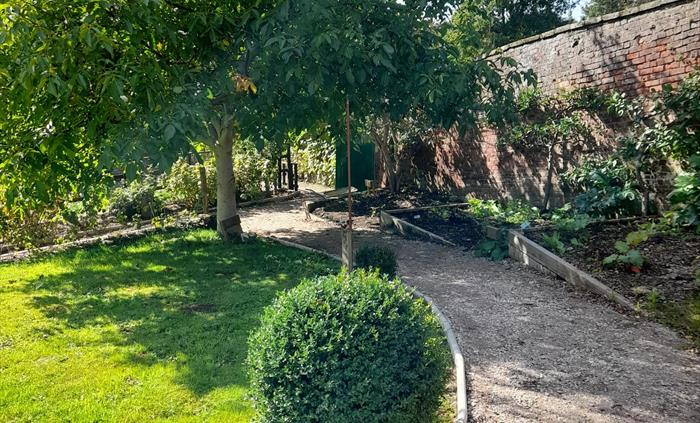 A pathway through the Victorian Walled Garden.